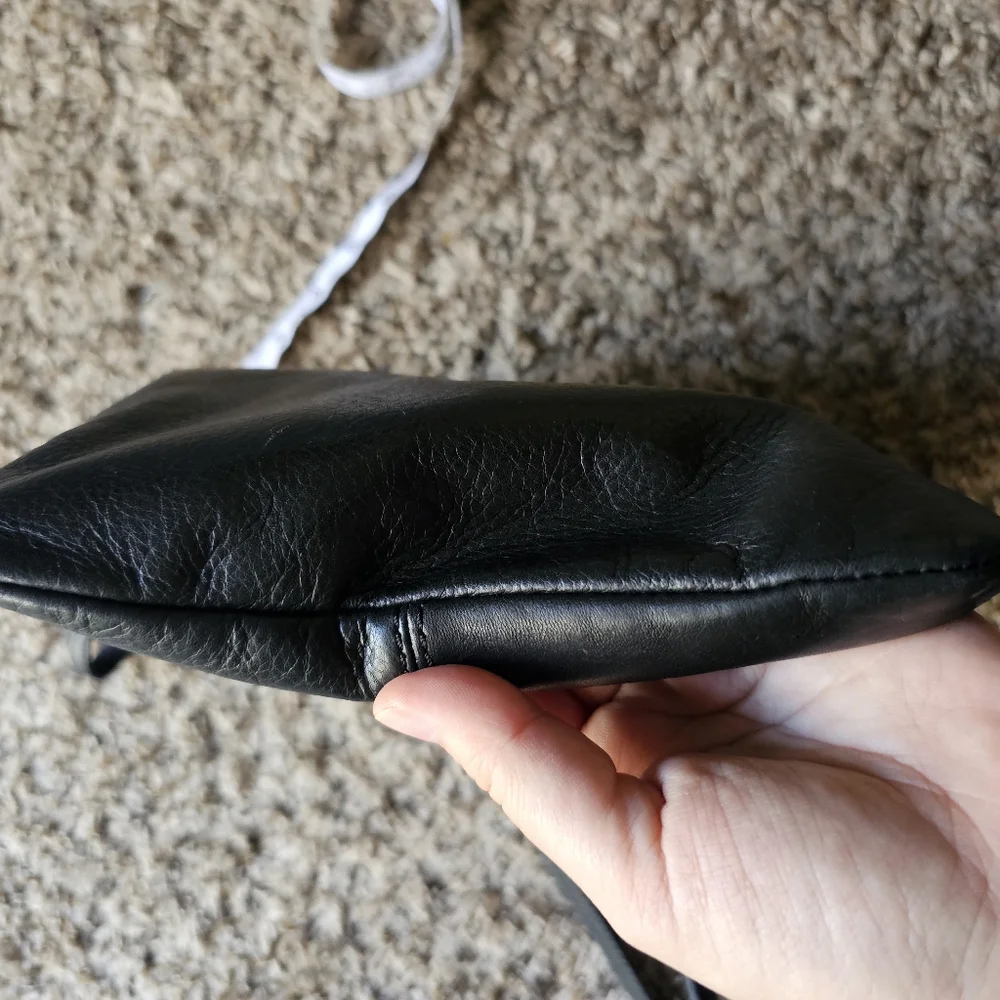 Margot black leather crossbody bag with corner pocket on‎ a front